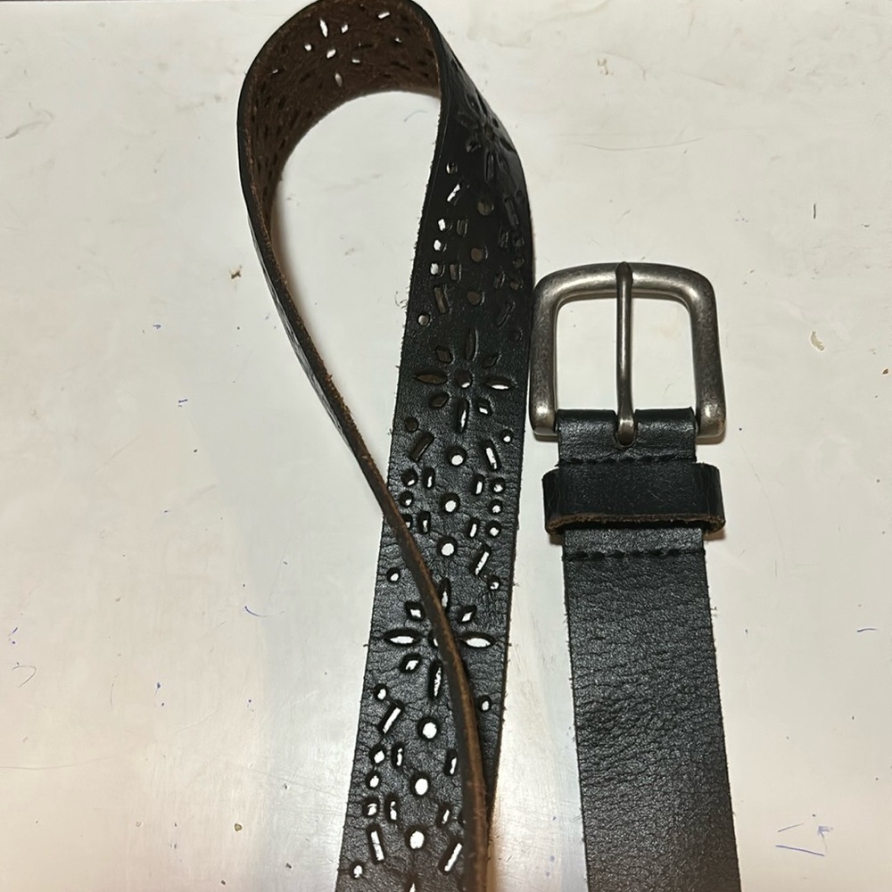 Black leather belt with suede inside. Unique cutout design. “Like new”condition.